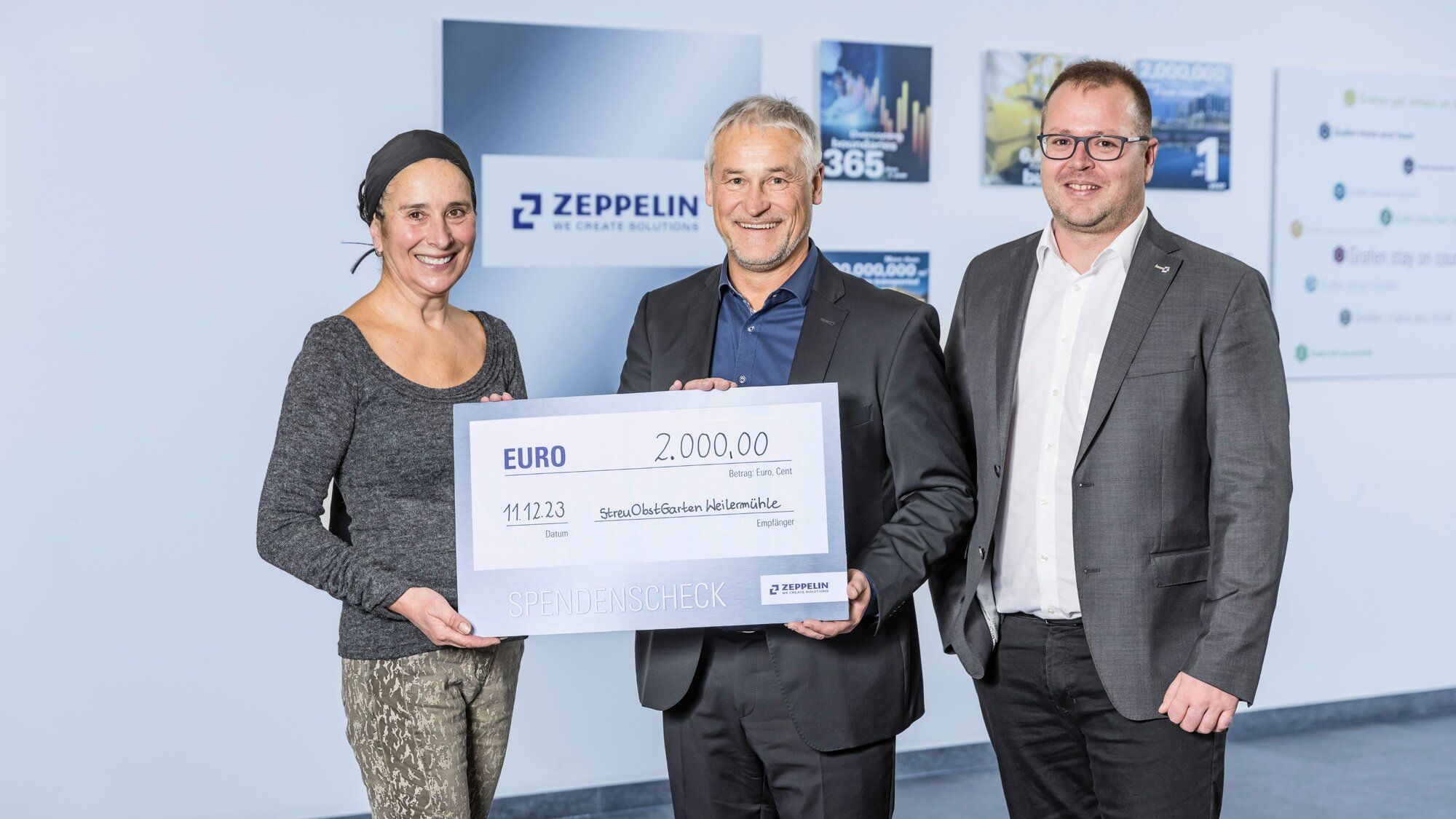 Zeppelin Systems überreicht Spendenchecks